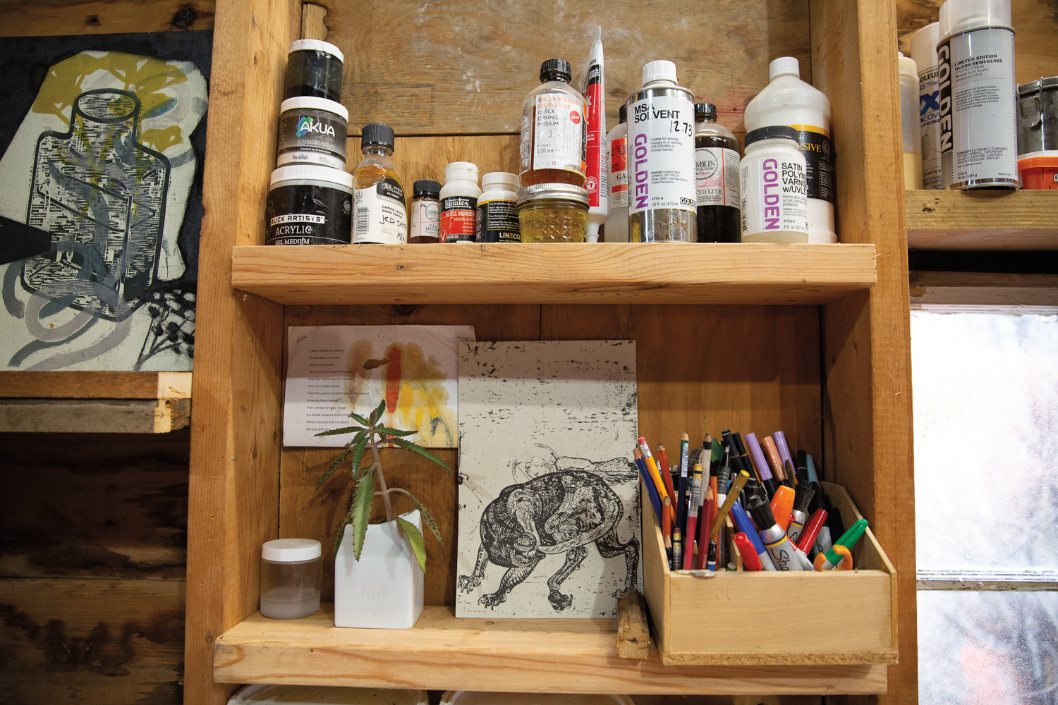 art supplies on a shelf