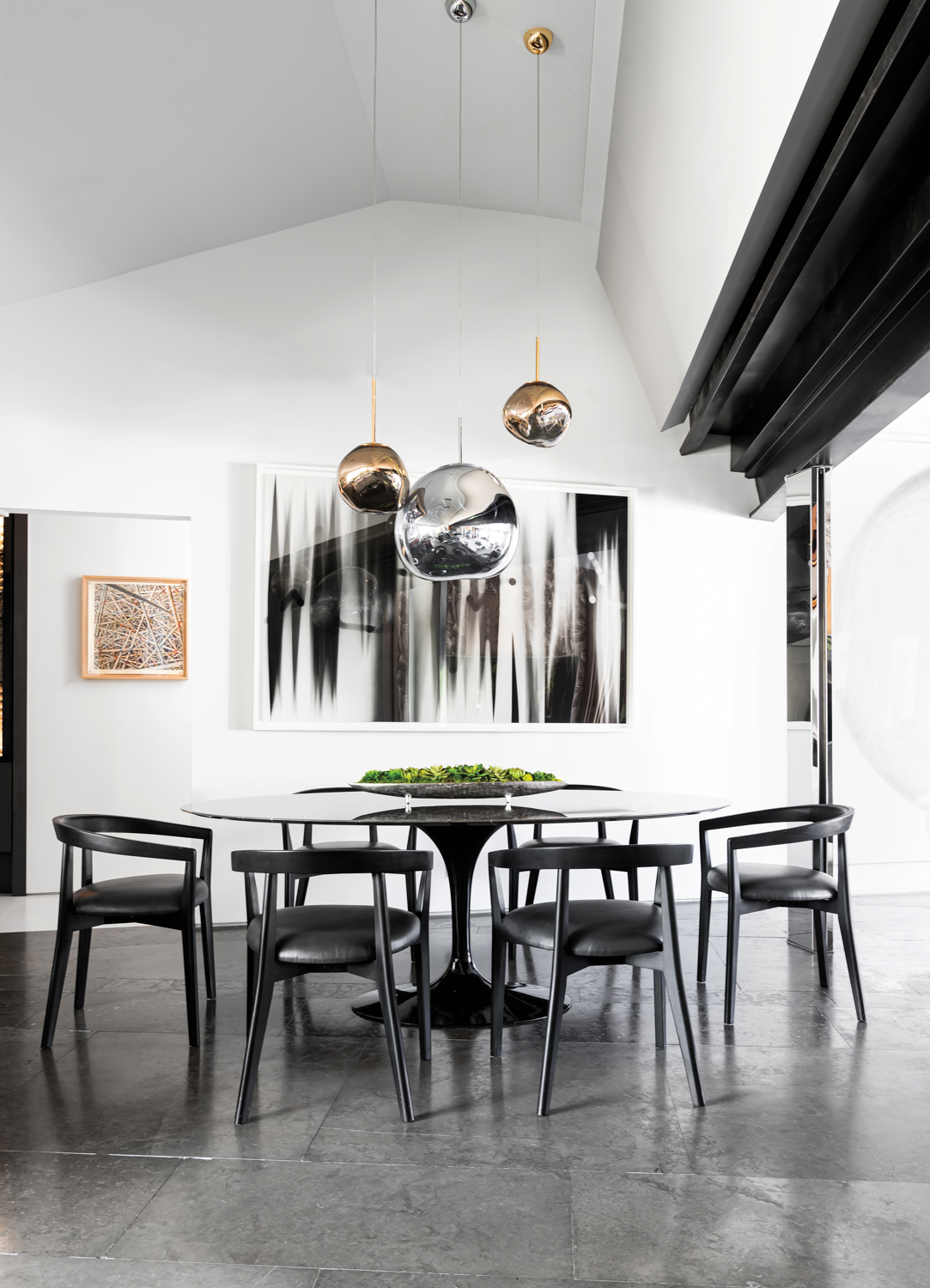 dining area with black pedestal...