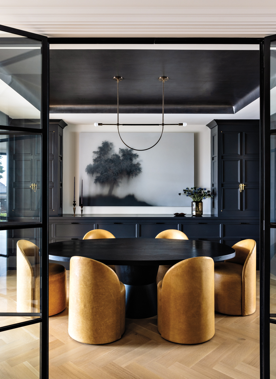dark-walled dining room in a...