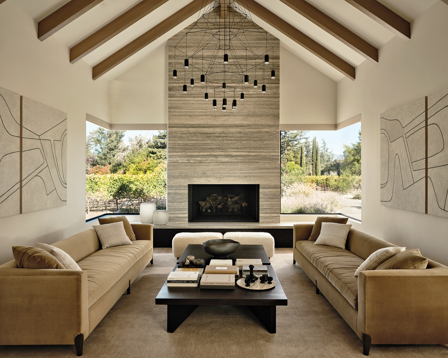 living room with exposed wooden beams and a neutral palette