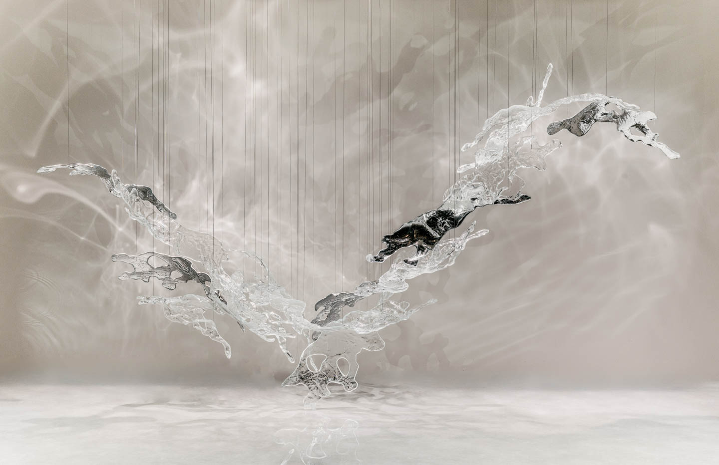 a glass lighting installation at Salone del Mobile 2025