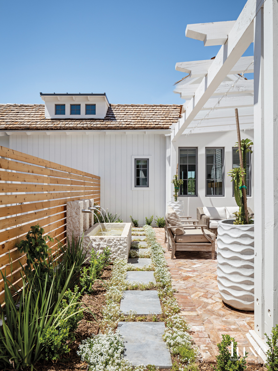 side courtyard features the landscape architecture and fountains