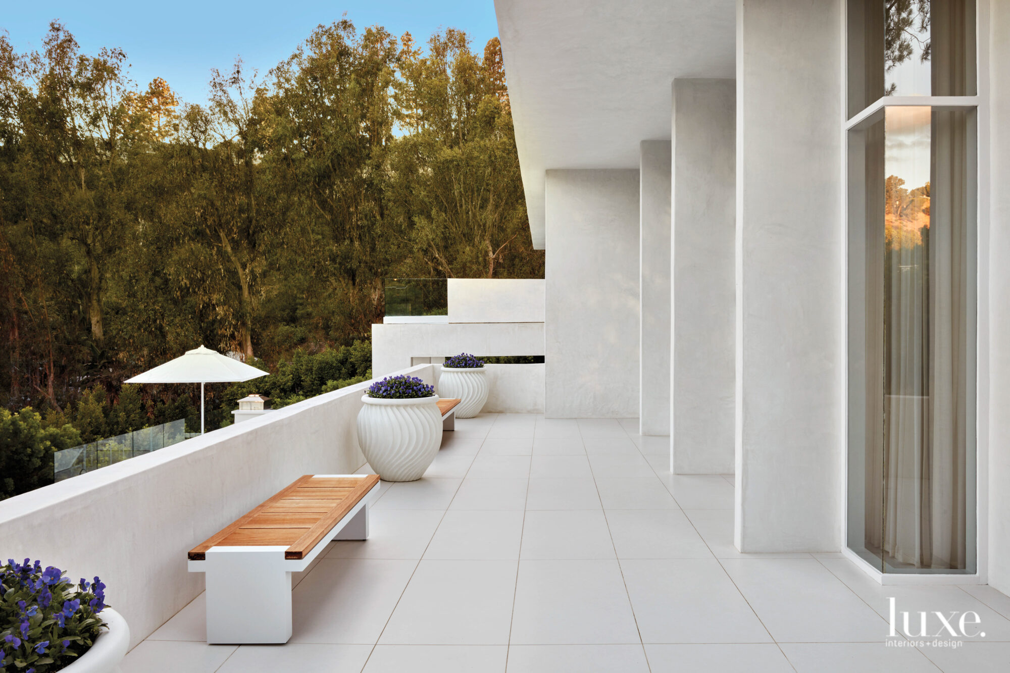 Exterior terrace shot with bench and planters