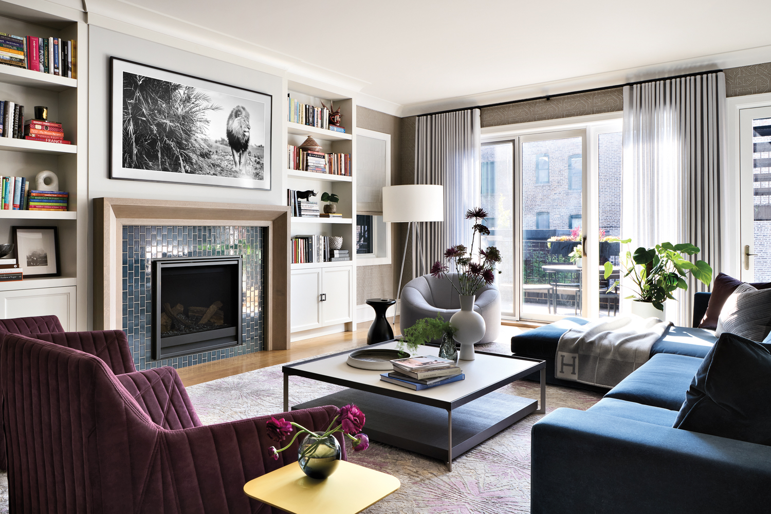 Family room with teal fireplace