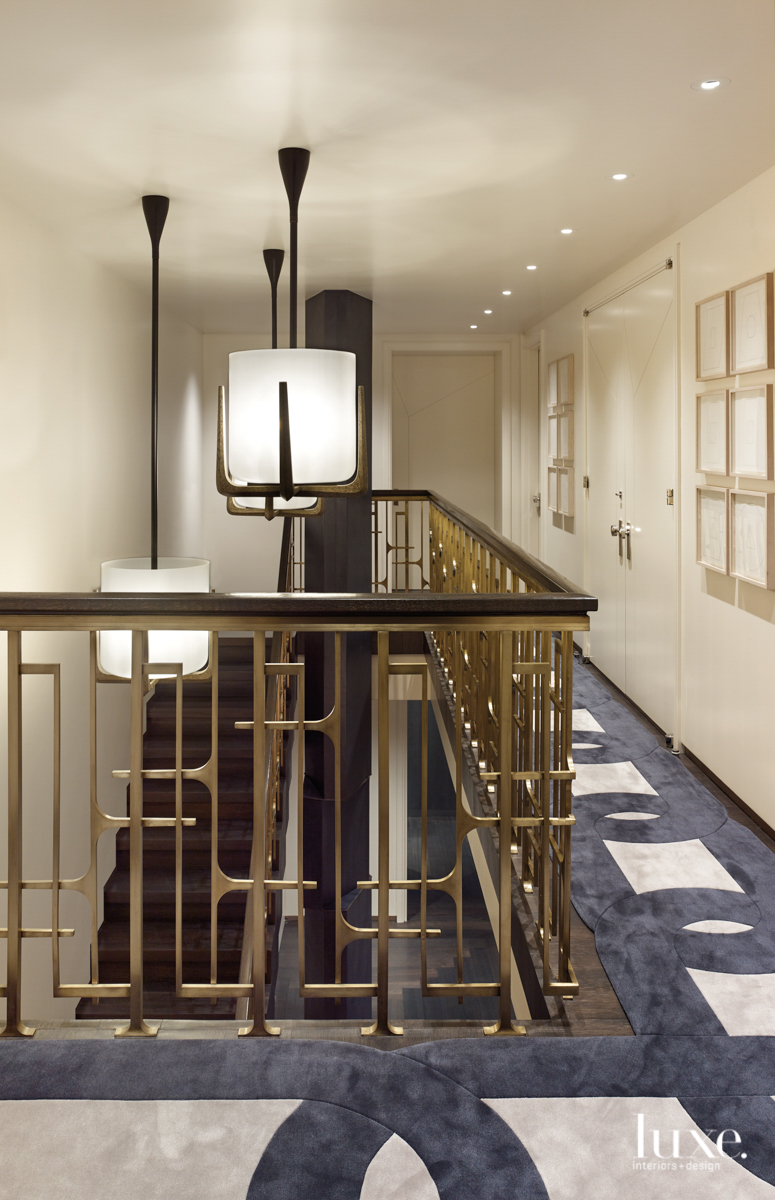 contemporary hallway and stairs gold accents