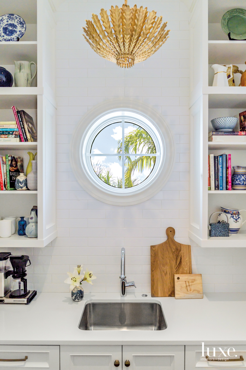 butlers pantry with porthole window