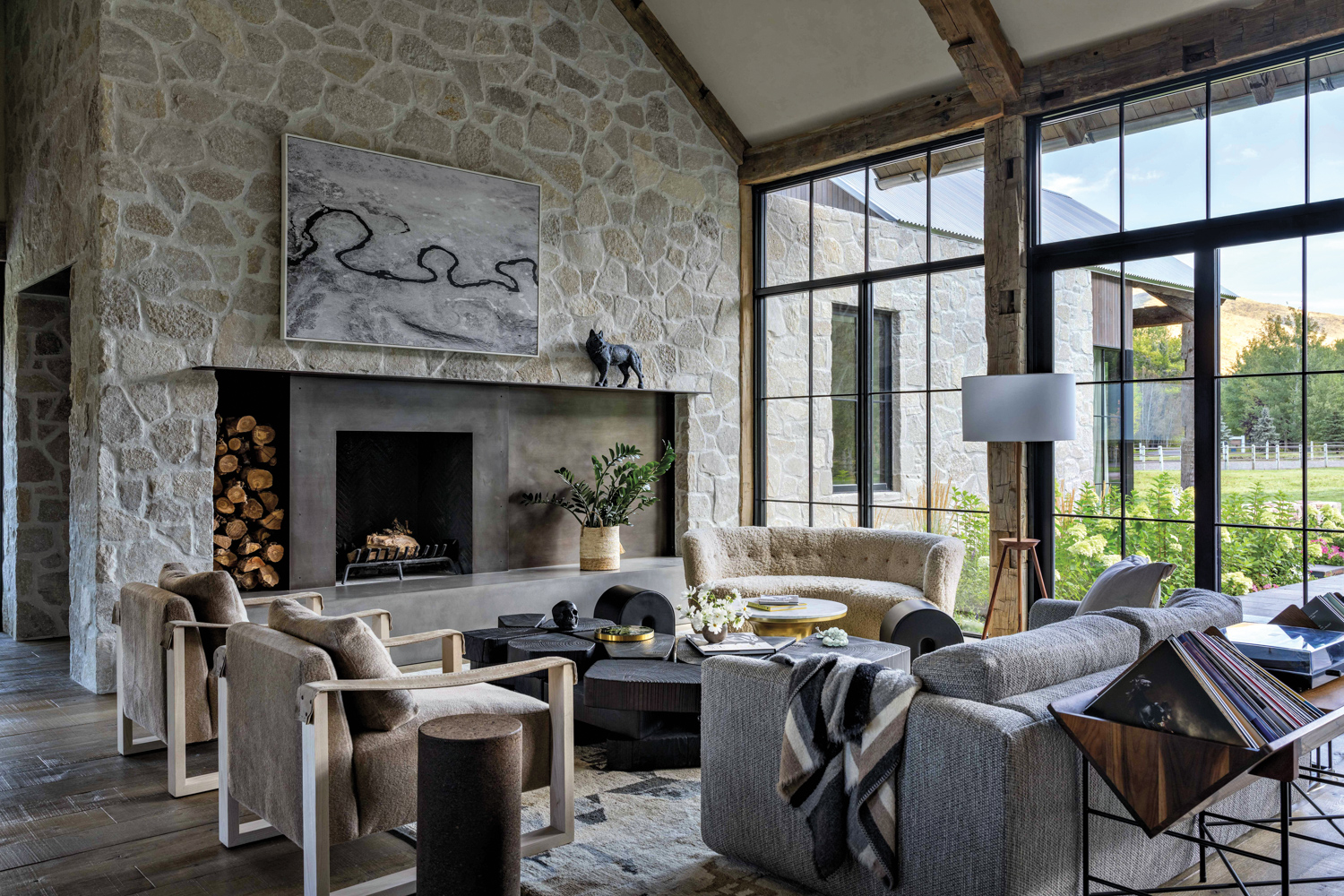 great room with a wall of stone