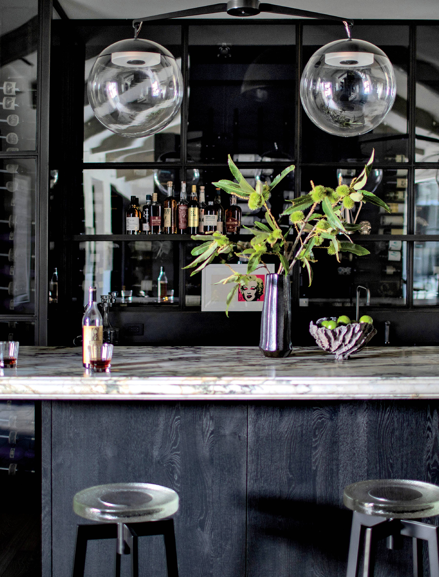 black and white home bar with a moody, contemporary aesthetic