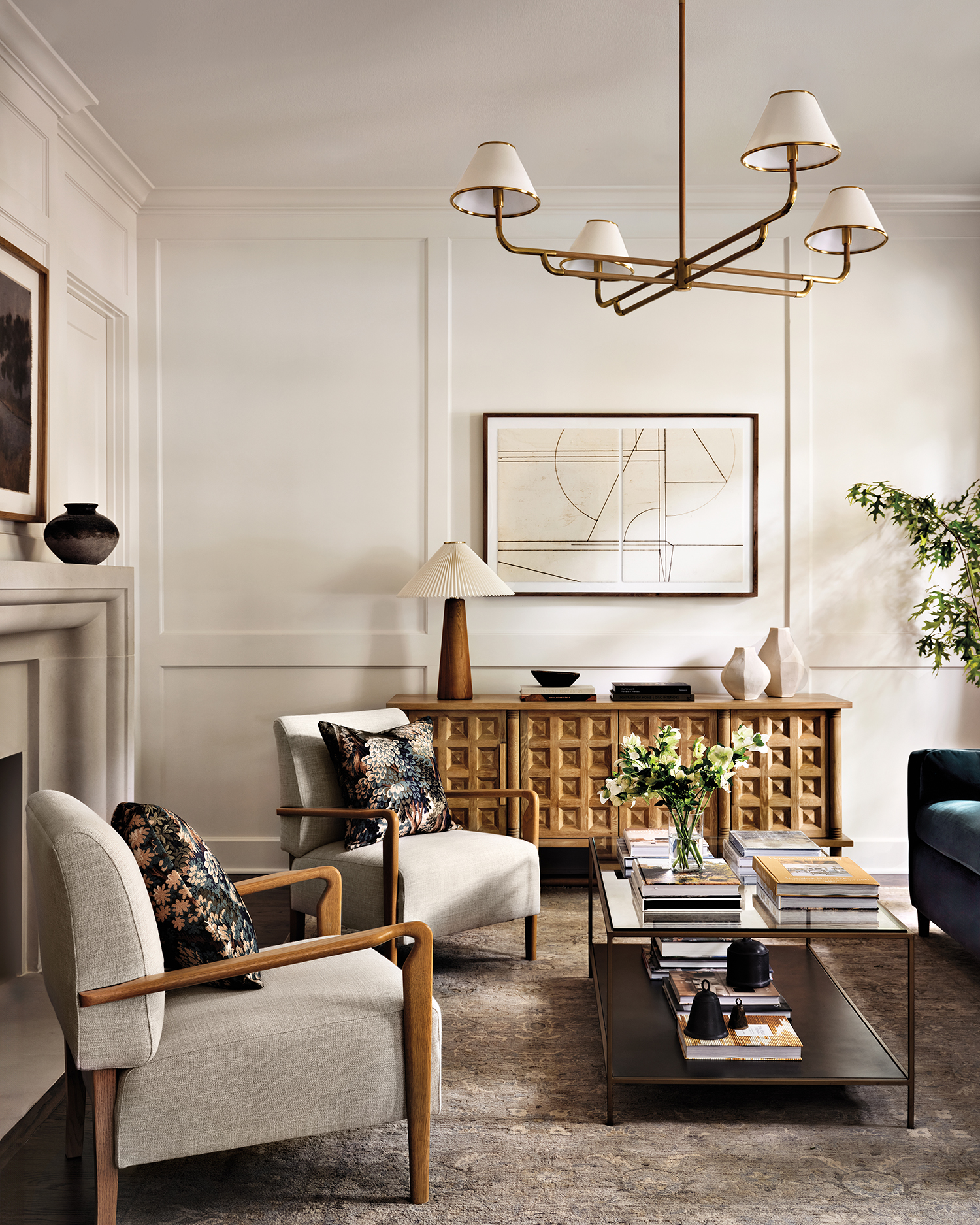 classic formal sitting room with a waffle textured console and armchairs surrounding a coffee table
