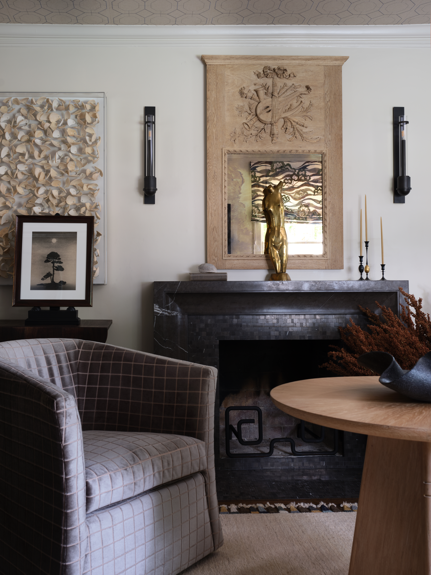living room with brown chairs and console