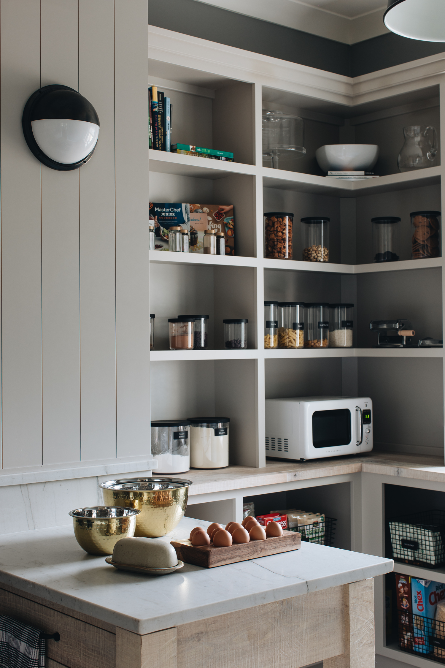 pantry with shelves of canned food