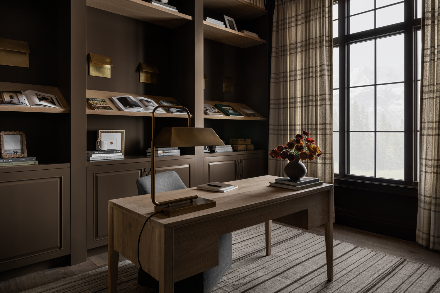 dark office with plaid drapes and brown desk