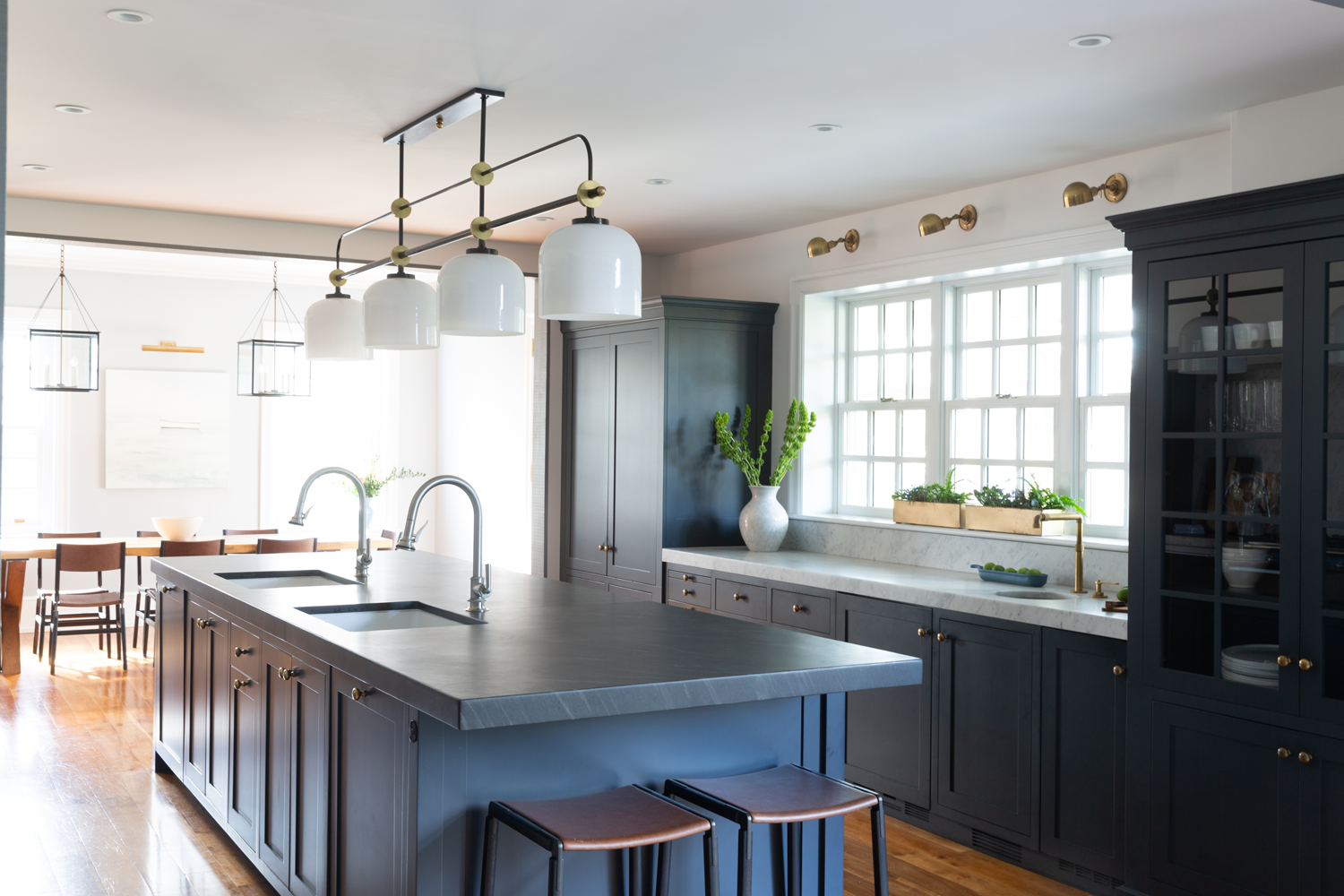 open kitchen with blue cabinetry and island
