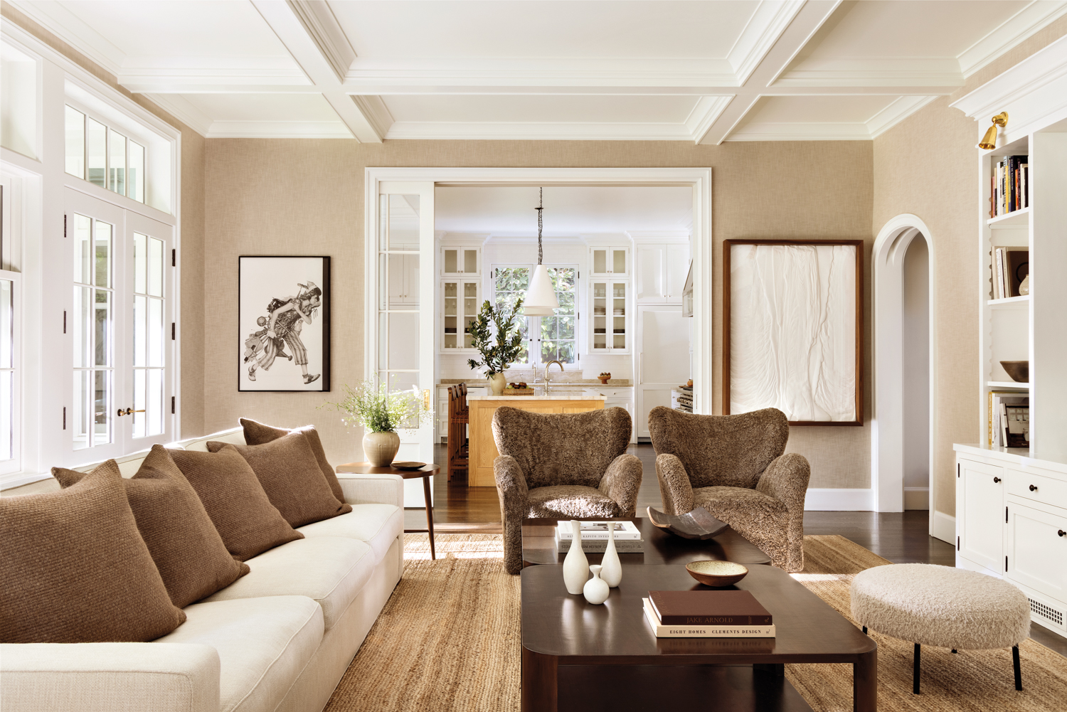 A cozy living room featuring a couch and a coffee table, creating a welcoming atmosphere for relaxation and socializing.