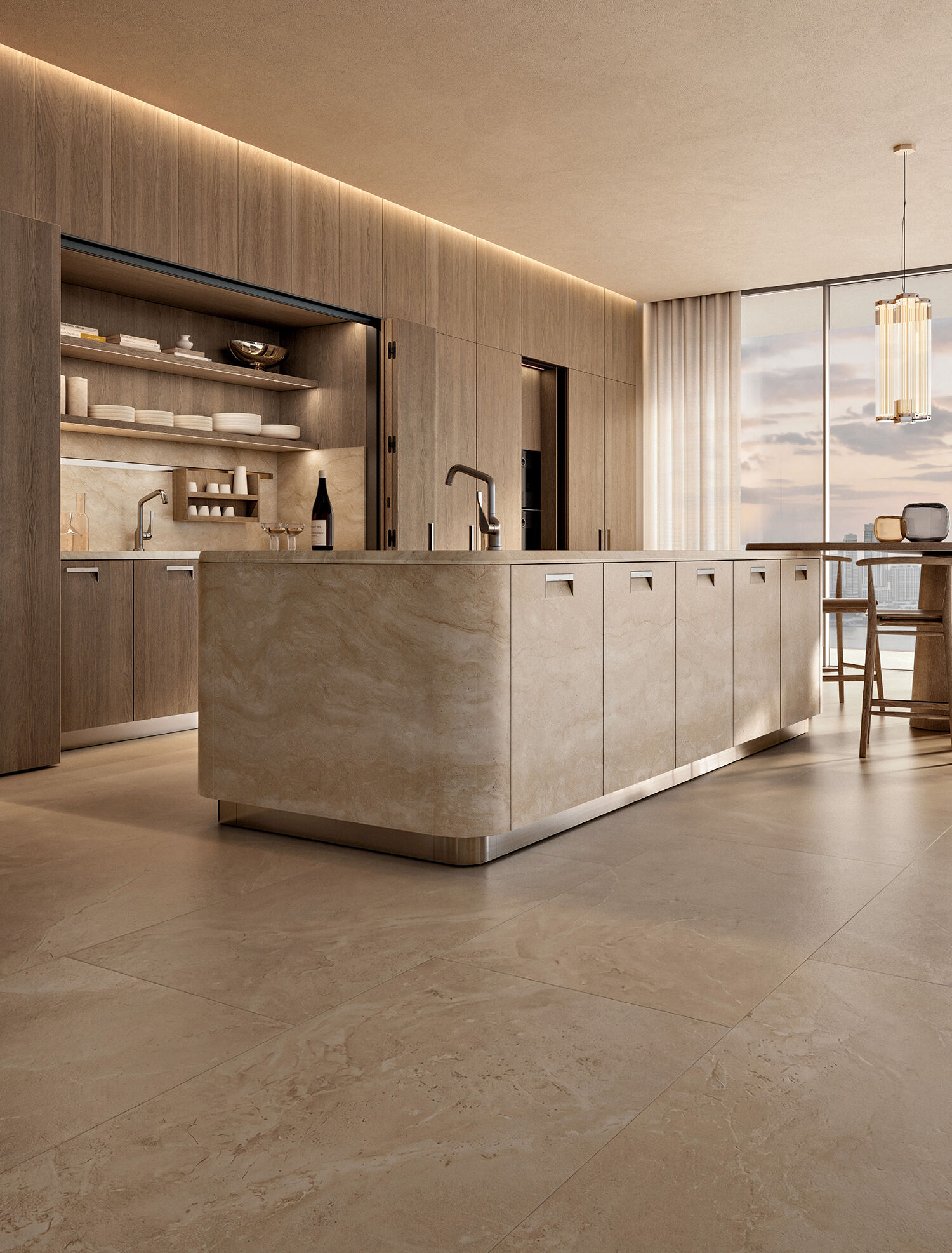 Modern kitchen with beige stone island, wood cabinets, built-in shelves, and large window letting in natural light.